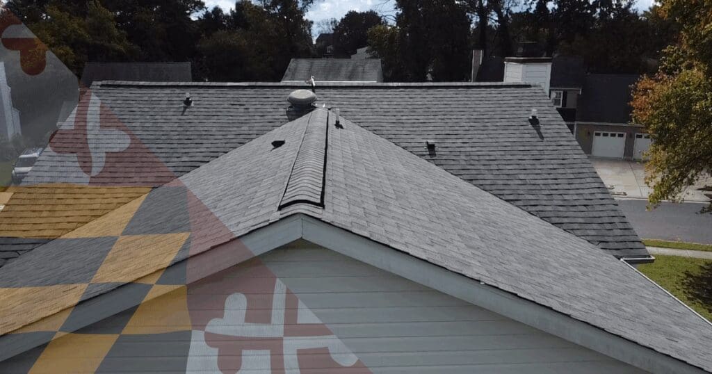 Close-up of a newly installed ridge vent on an asphalt shingle roof, demonstrating the exact exhaust ventilation mathematics required to prevent thermal shock and structural delamination.